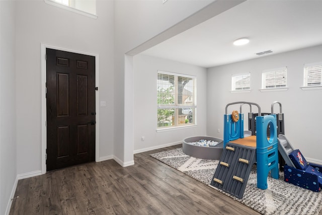 5604 Deer Run Dr, Celina, TX 75009 - entryway featuring visible vents, baseboards, and wood finished floors