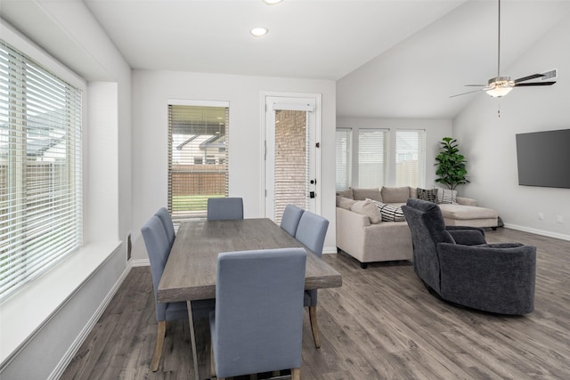 dining area with ceiling fan, vaulted ceiling, wood finished floors, baseboards, and recessed lighting