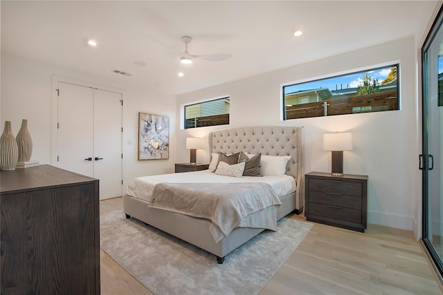bedroom with visible vents, a closet, recessed lighting, light wood-type flooring, and a ceiling fan