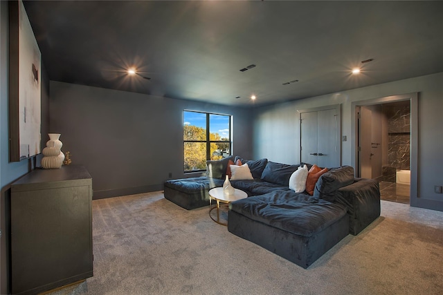 carpeted living room featuring recessed lighting and visible vents