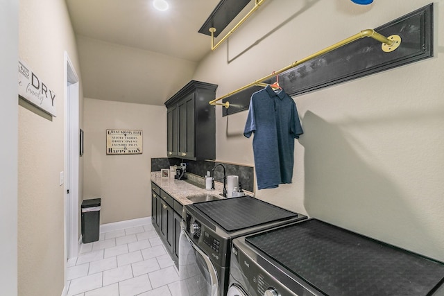 126 Esther Ct, Millsap, TX 76066 - laundry area with cabinet space, a sink, separate washer and dryer, baseboards, and light tile patterned floors