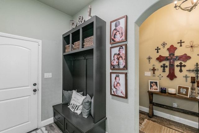 126 Esther Ct, Millsap, TX 76066 - mudroom featuring baseboards, arched walkways, and wood finished floors