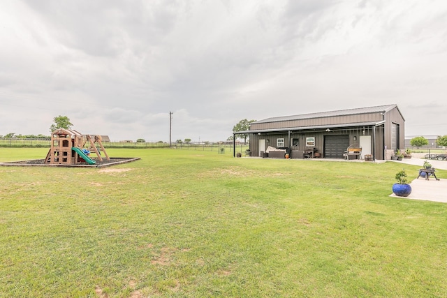 126 Esther Ct, Millsap, TX 76066 - view of yard with an outdoor structure, a playground, fence, and a detached garage