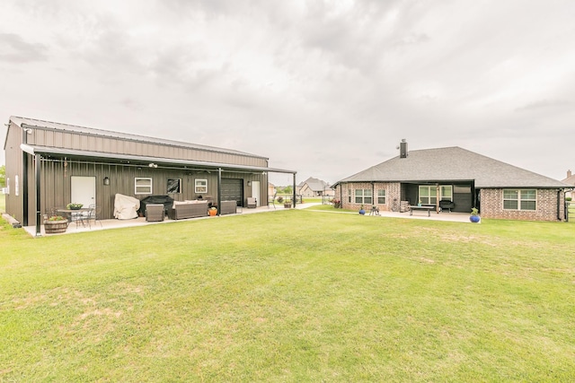 126 Esther Ct, Millsap, TX 76066 - back of property with an outdoor living space, a patio area, a lawn, and brick siding