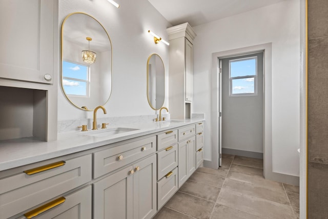 1900 County Road 1255, Savoy, TX 75479 - full bathroom with double vanity, a sink, baseboards, and tile patterned floors
