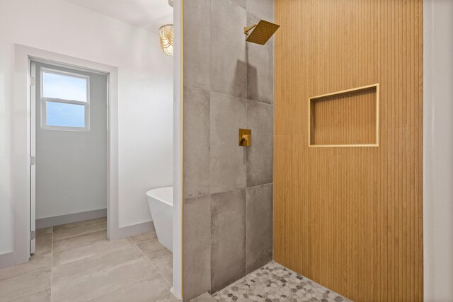 1900 County Road 1255, Savoy, TX 75479 - bathroom featuring a freestanding bath, tiled shower, and tile patterned flooring