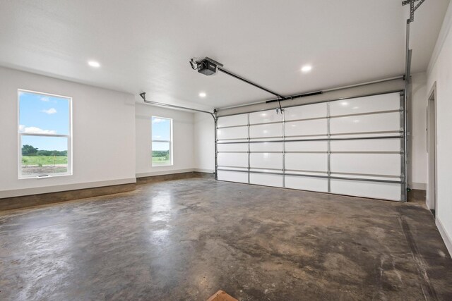 1900 County Road 1255, Savoy, TX 75479 - garage featuring recessed lighting, baseboards, and a garage door opener