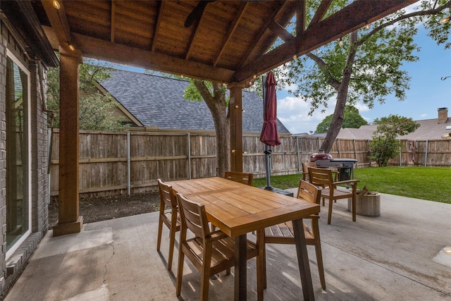 view of patio / terrace with outdoor dining area and a fenced backyard