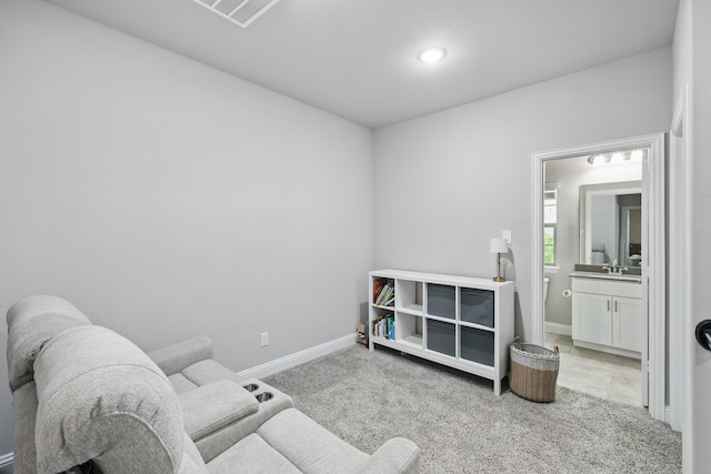 sitting room with baseboards, carpet flooring, visible vents, and recessed lighting