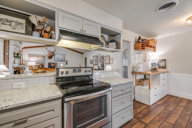 kitchen with visible vents, open shelves, dark wood finished floors, electric stove, and under cabinet range hood