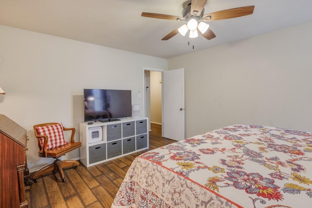bedroom with dark wood finished floors and ceiling fan