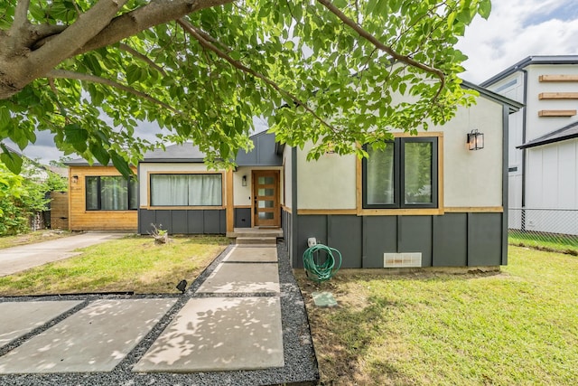 9978 Witham St, Dallas, TX 75220 - view of front of home featuring a front lawn and fence