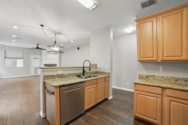 kitchen featuring a sink, stainless steel dishwasher, dark wood-style flooring, and visible vents