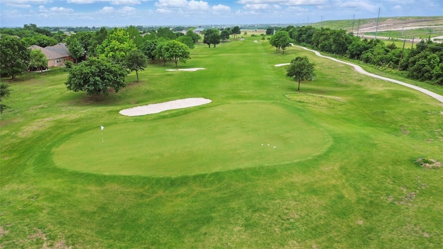 view of home's community with golf course view