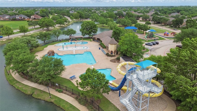 bird's eye view with a water view