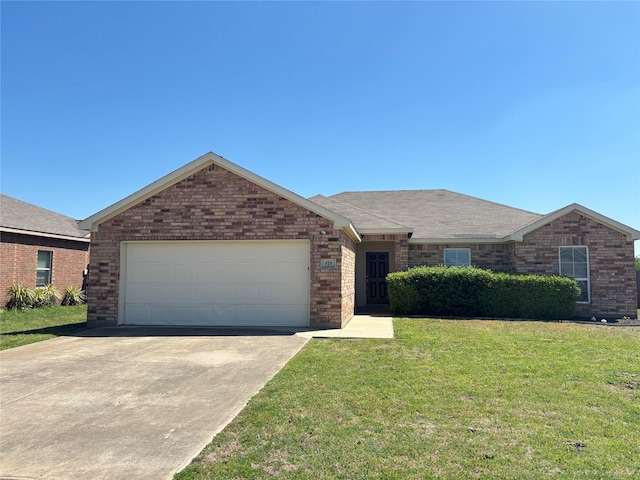 single story home featuring concrete driveway, brick siding, a garage, and a front lawn