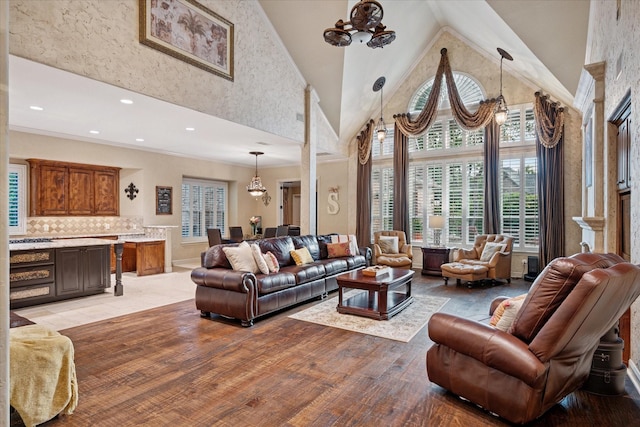 400 Indian Paintbrush Way, Southlake, TX 76092 - living area with an inviting chandelier, a healthy amount of sunlight, and high vaulted ceiling