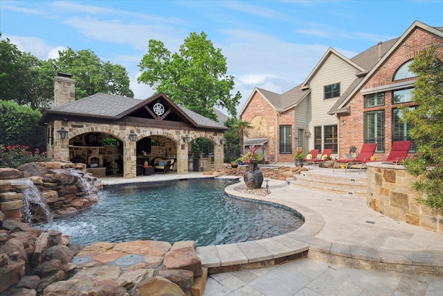 400 Indian Paintbrush Way, Southlake, TX 76092 - outdoor pool featuring an outdoor living space with a fireplace and a patio area
