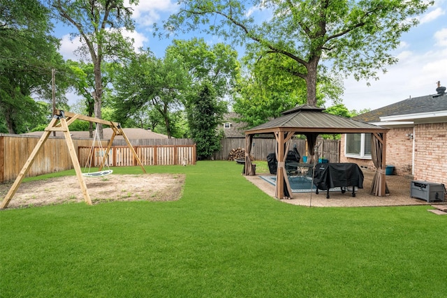 2009 Greenbriar Ln, Plano, TX 75074 - view of yard with a gazebo, a patio, and a playground