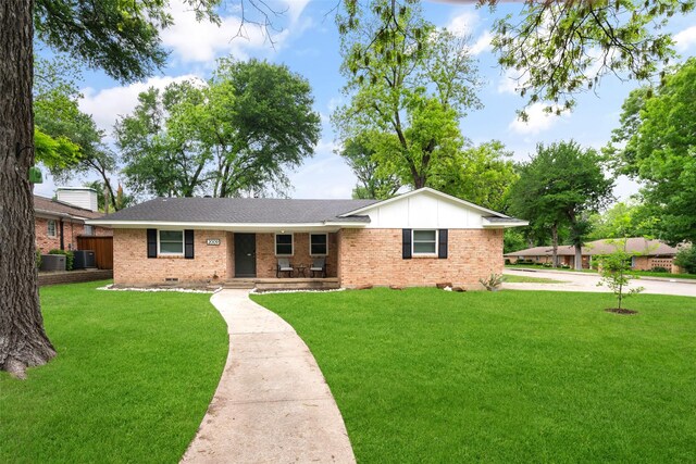 2009 Greenbriar Ln, Plano, TX 75074 - single story home featuring brick siding, a porch, a front yard, board and batten siding, and central AC