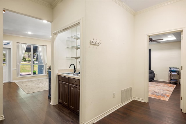 6510 Circo Dr, Granbury, TX 76049 - hallway featuring dark wood finished floors, a sink, crown molding, baseboards, and recessed lighting