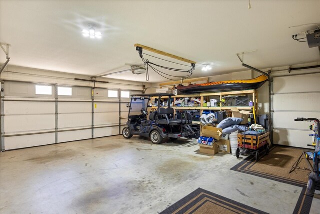 6510 Circo Dr, Granbury, TX 76049 - garage featuring a garage door opener