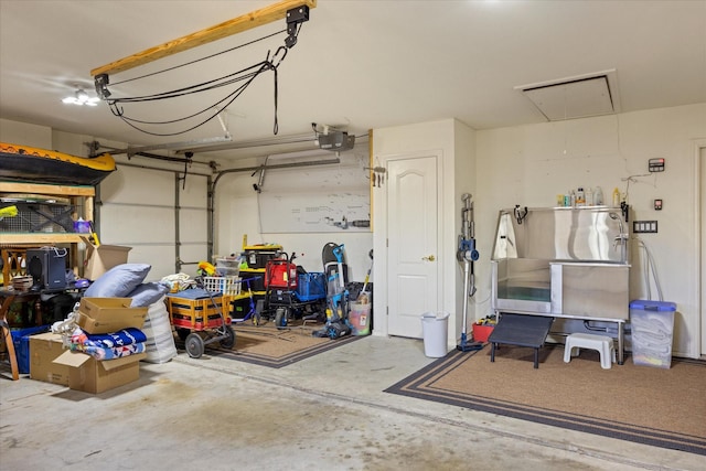 6510 Circo Dr, Granbury, TX 76049 - garage featuring a garage door opener