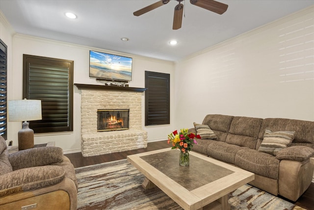 6510 Circo Dr, Granbury, TX 76049 - living room featuring wood finished floors, ceiling fan, ornamental molding, a fireplace, and recessed lighting