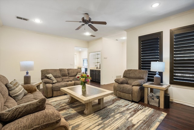 6510 Circo Dr, Granbury, TX 76049 - living area featuring wood finished floors, ceiling fan, ornamental molding, recessed lighting, and baseboards