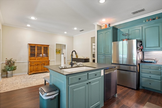 6510 Circo Dr, Granbury, TX 76049 - kitchen with stainless steel appliances, a sink, ornamental molding, dark wood-style floors, and recessed lighting