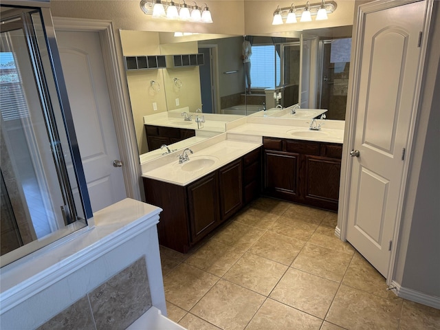1121 Albany Dr, Fort Worth, TX 76131 - bathroom featuring vanity, tile patterned floors, and a stall shower