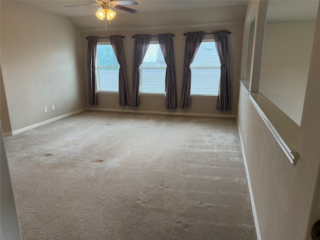1121 Albany Dr, Fort Worth, TX 76131 - unfurnished room with baseboards, carpet flooring, a ceiling fan, and a healthy amount of sunlight