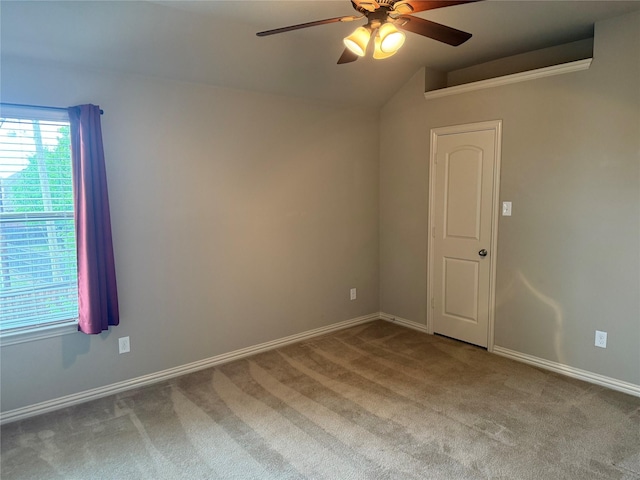 1121 Albany Dr, Fort Worth, TX 76131 - carpeted empty room with a ceiling fan, baseboards, and vaulted ceiling