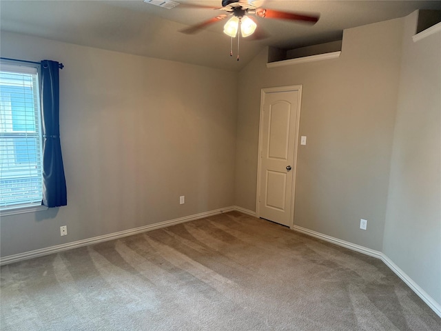 1121 Albany Dr, Fort Worth, TX 76131 - carpeted empty room with baseboards, ceiling fan, a wealth of natural light, and visible vents