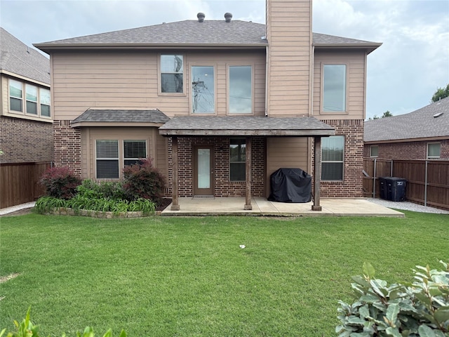 1121 Albany Dr, Fort Worth, TX 76131 - rear view of property with brick siding, a fenced backyard, a chimney, a patio, and a yard