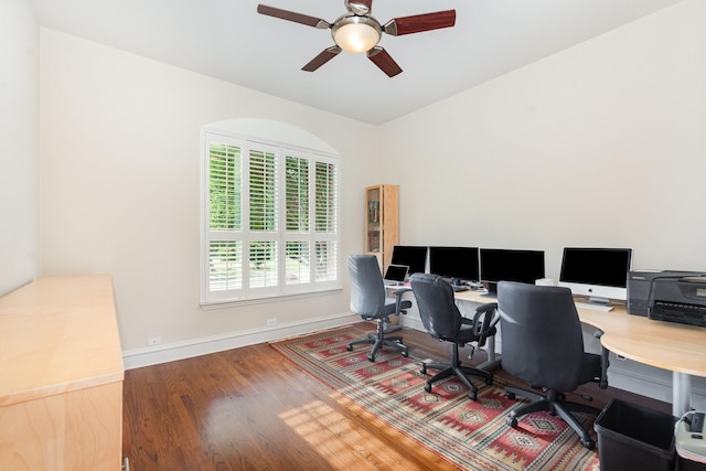 home office featuring baseboards, ceiling fan, and wood finished floors