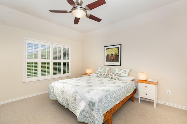 bedroom featuring carpet floors, a ceiling fan, and baseboards