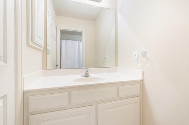 full bathroom featuring vanity