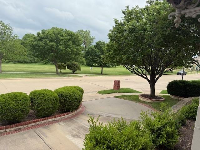surrounding community with a yard