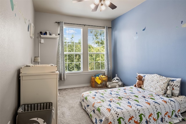 bedroom featuring baseboards, carpet, and ceiling fan