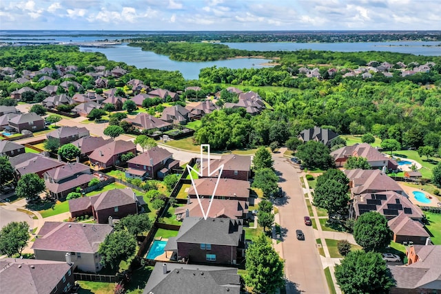 aerial view with a water view and a residential view