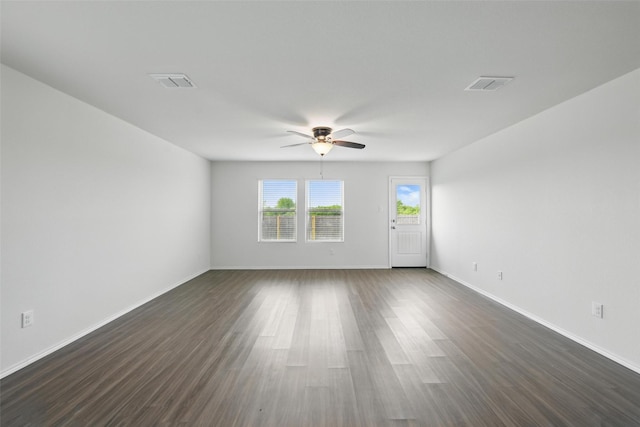 329 Blue Crow Ln, Fort Worth, TX 76052 - unfurnished room featuring a ceiling fan, baseboards, visible vents, and dark wood-style floors