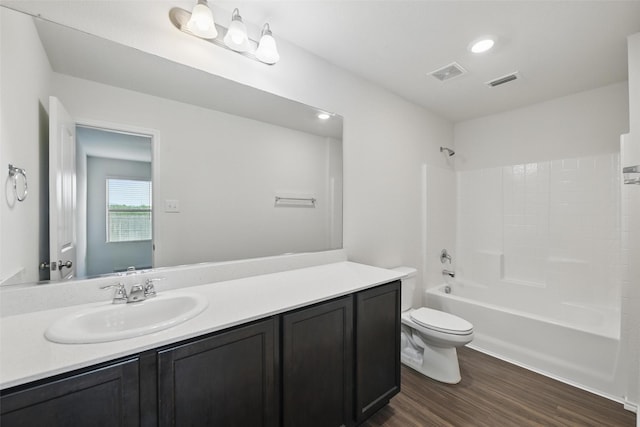 329 Blue Crow Ln, Fort Worth, TX 76052 - bathroom with visible vents, wood finished floors, toilet, and vanity