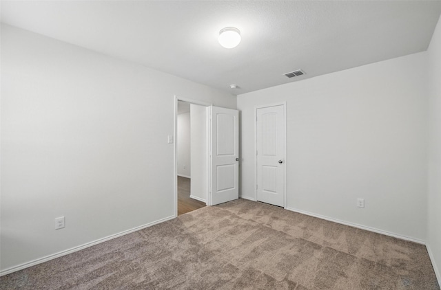 329 Blue Crow Ln, Fort Worth, TX 76052 - unfurnished bedroom featuring baseboards, carpet, and visible vents