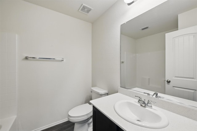 329 Blue Crow Ln, Fort Worth, TX 76052 - full bathroom with toilet, visible vents, wood finished floors, and vanity