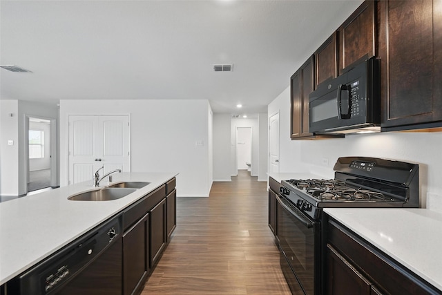 329 Blue Crow Ln, Fort Worth, TX 76052 - kitchen with a sink, light countertops, black appliances, and visible vents
