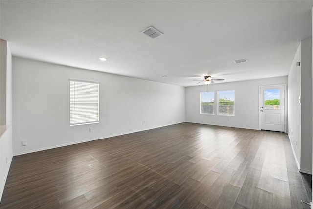 329 Blue Crow Ln, Fort Worth, TX 76052 - unfurnished room with baseboards, a ceiling fan, dark wood-style flooring, and visible vents
