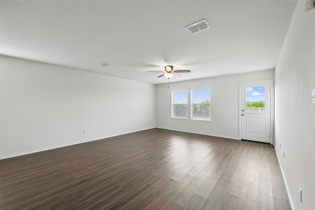 329 Blue Crow Ln, Fort Worth, TX 76052 - empty room with dark wood-style flooring, ceiling fan, visible vents, and baseboards
