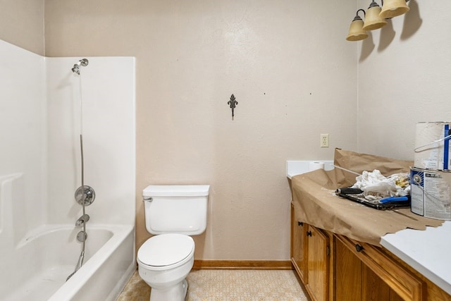 bathroom with shower / bath combination, baseboards, vanity, and toilet