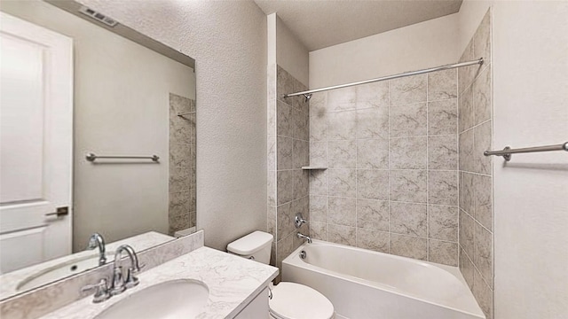 full bath with shower / bathtub combination, toilet, and vanity
